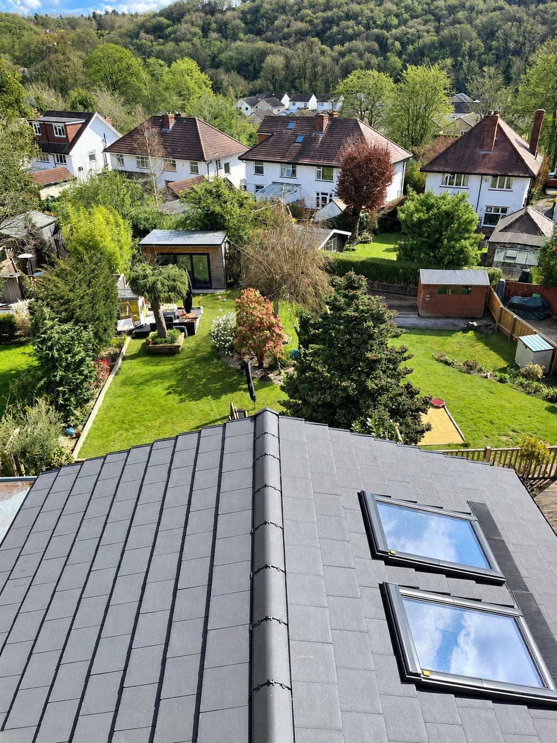 View from the loft over the new roof and rooflights to the gardens