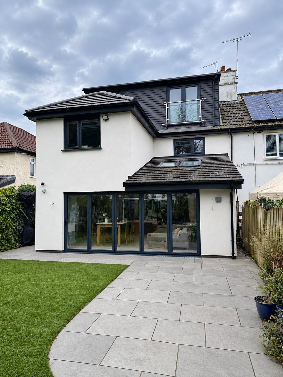 Rear elevation and the paved garden path