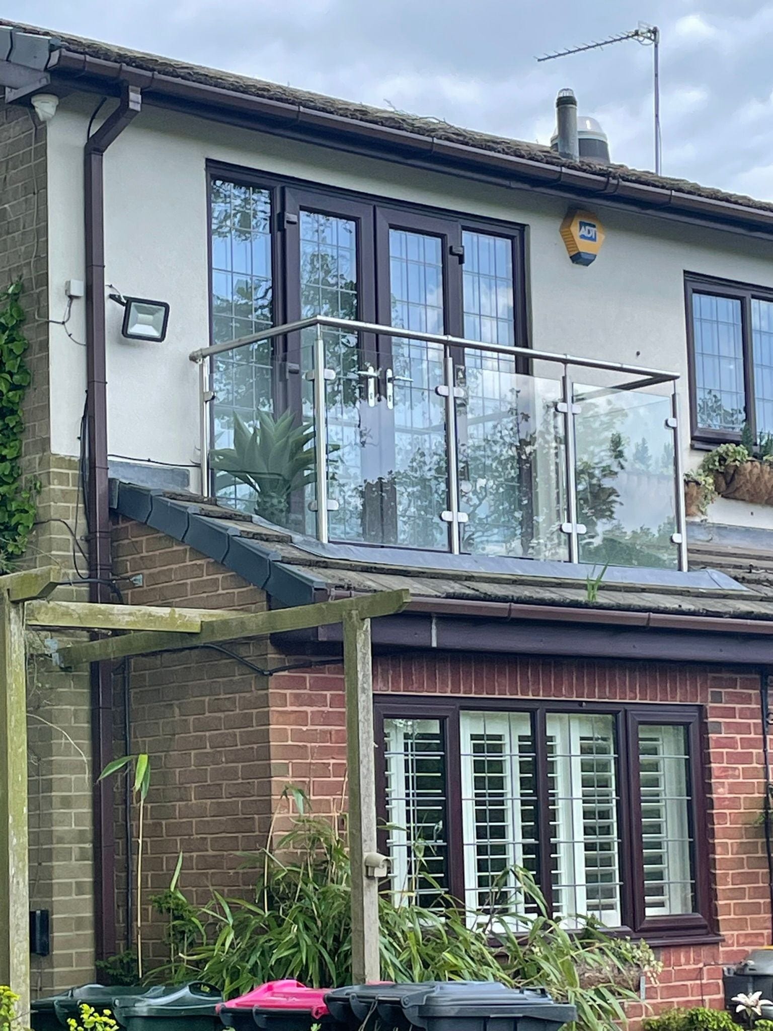 The completed glazed balcony and bi-folding doors