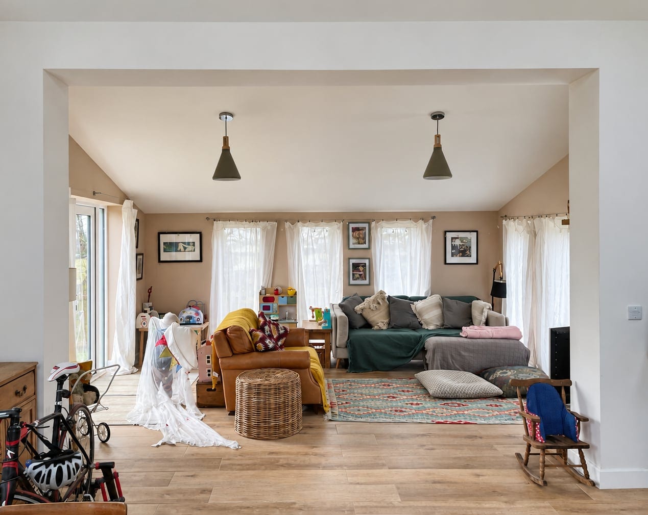 Living room with sofas and pendant lights