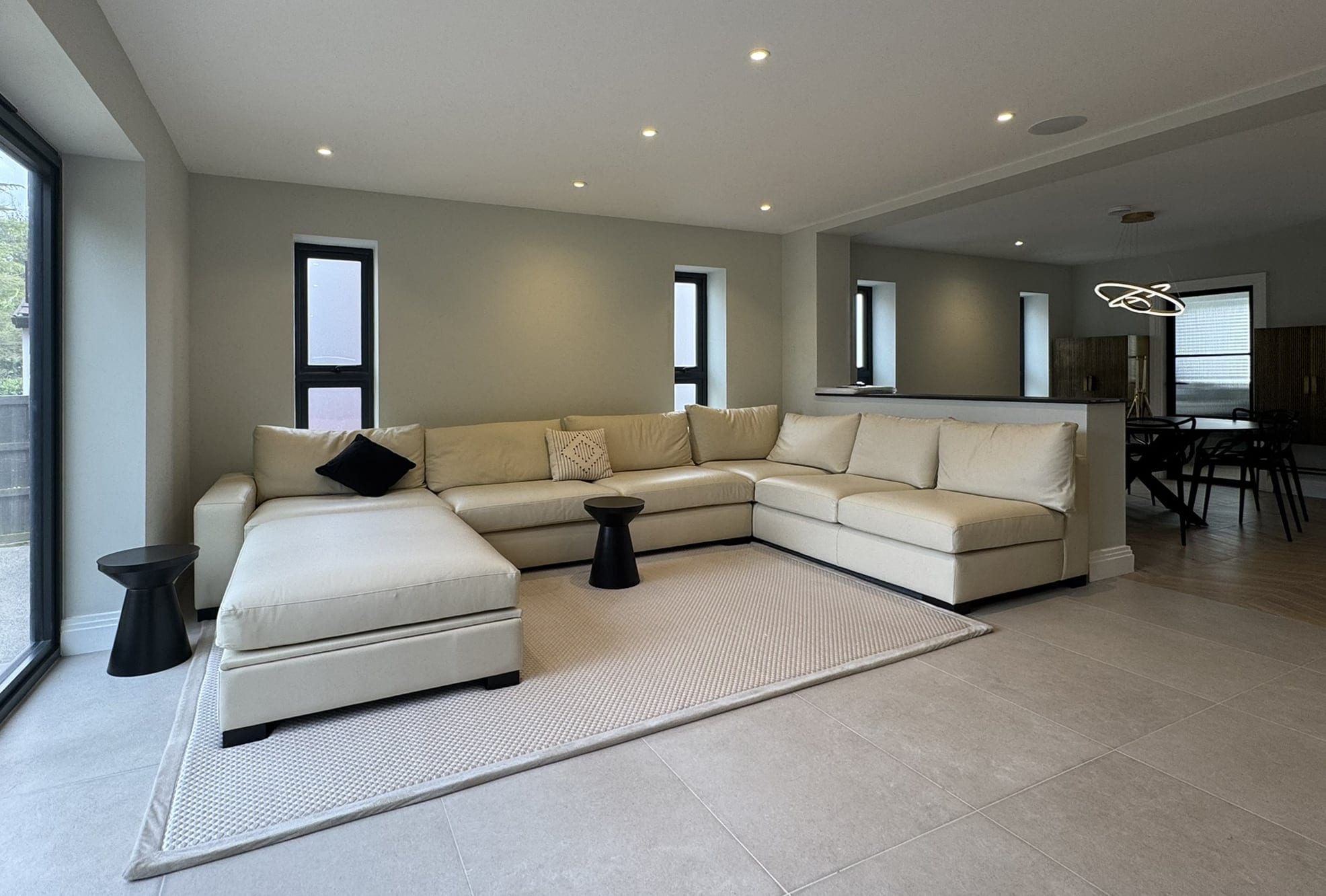 Open-plan family room with a large corner sofa