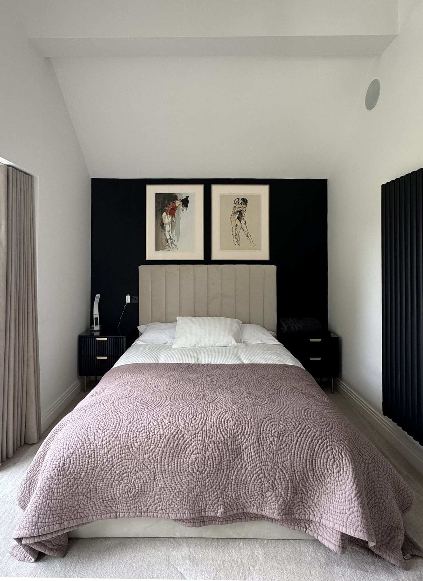 Bedroom with a panelled headboard
