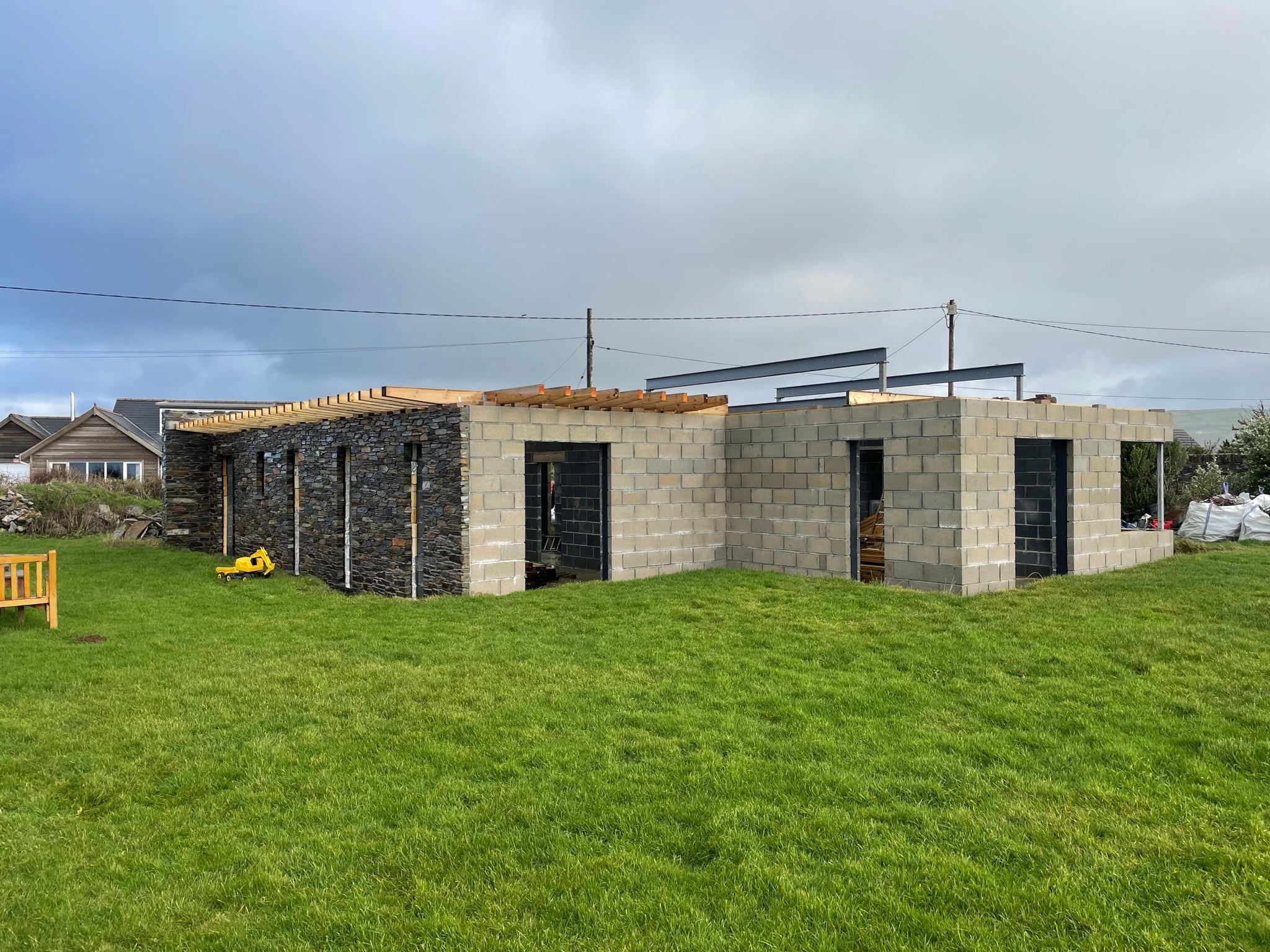 Construction: stone and blockwork walls across the site