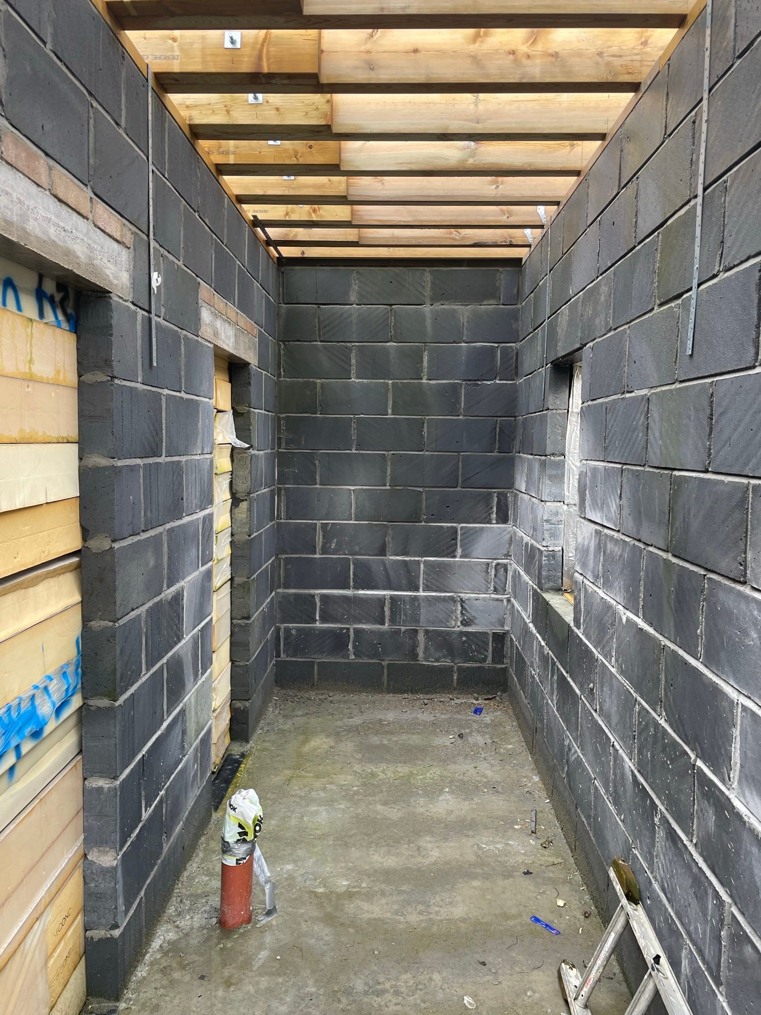 Construction: inside the walls, blockwork and the timber roof structure